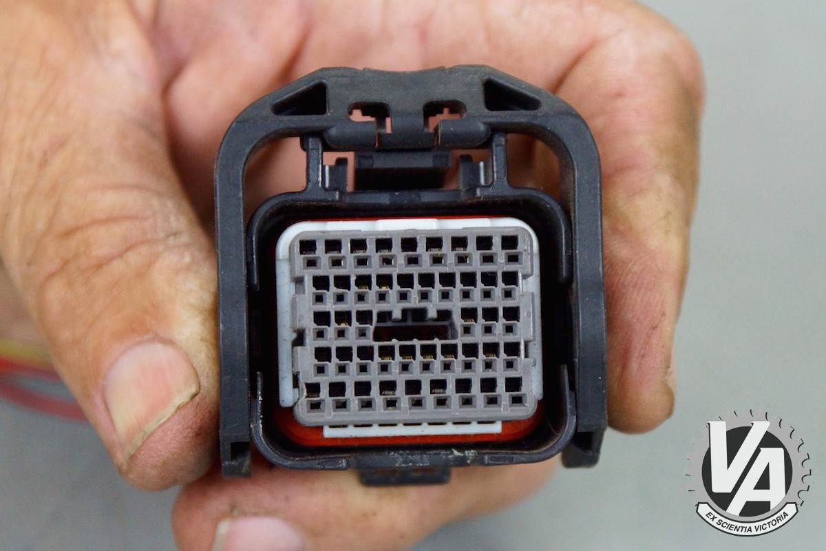 Removing the Plastic Guard and Lifting the Lock on OBD2D Connectors