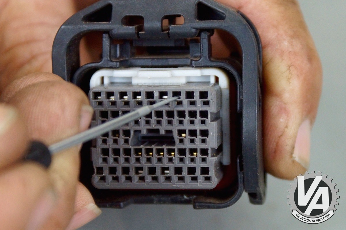 Releasing the Tab and Removing the Wire on OBD2D Connectors