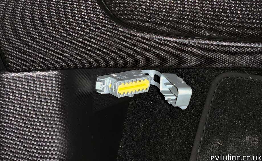 OBD2 Scanner Displaying Diagnostic Codes from a Smart Car