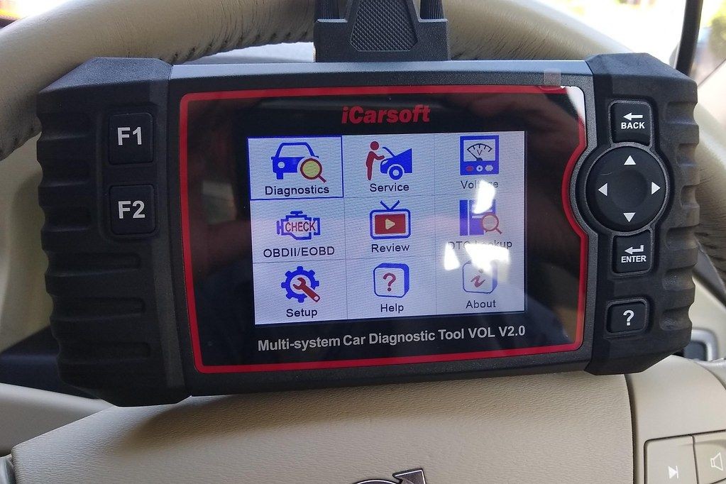 An illuminated check engine light on a car's dashboard