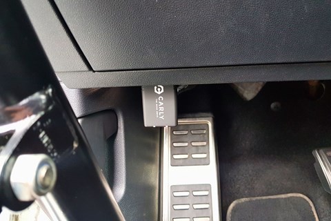 Carly OBD II scanner installed in a car