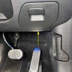 Illuminating the OBD2 Port with a Flashlight in a Smart Car
