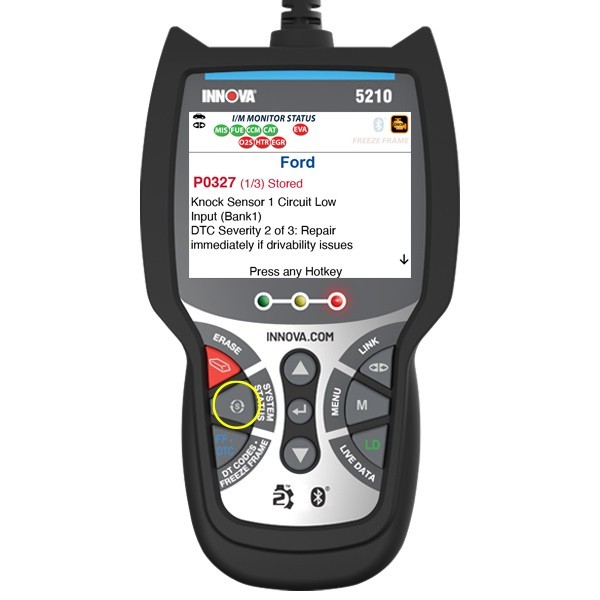 An OBD2 scanner displaying diagnostic codes.