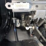 Plug the OBD2 scanner into the port
