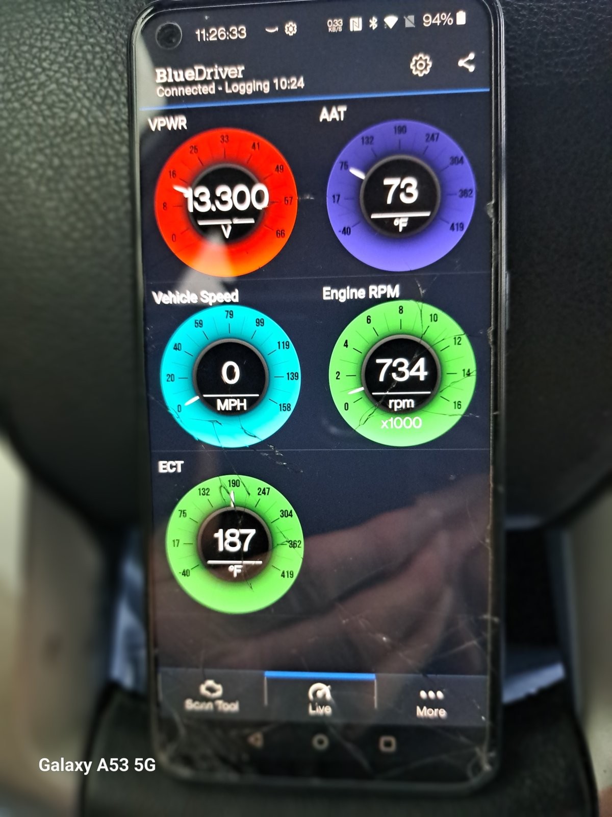 BlueDriver OBD2 scanner connected to a car's OBD2 port